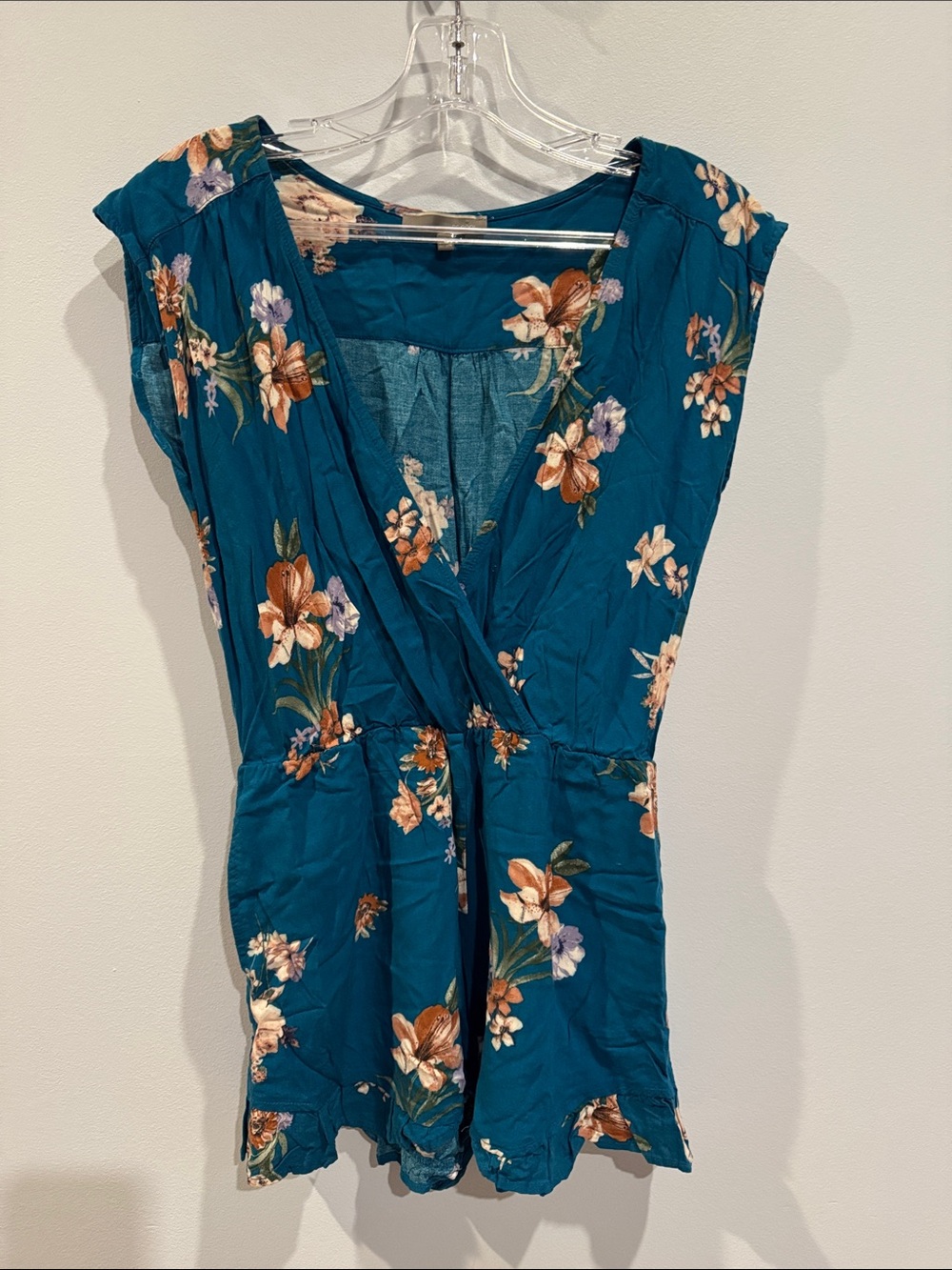 BE COOL teal floral surplice romper with ruffled hem Size Small